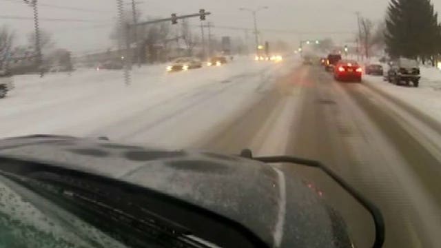 "It's that time of year:" Snow falls during rush hour, makes evening commute slow-going for many