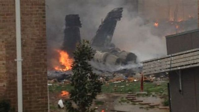 All accounted for after Navy fighter jet crashes into apartments