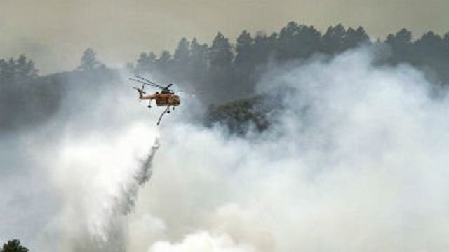 Firefighters try to corral Colorado blaze that's destroyed 181 homes