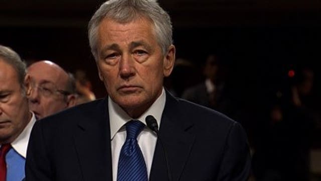 Hagel takes on critics, aligns himself with Obama policies