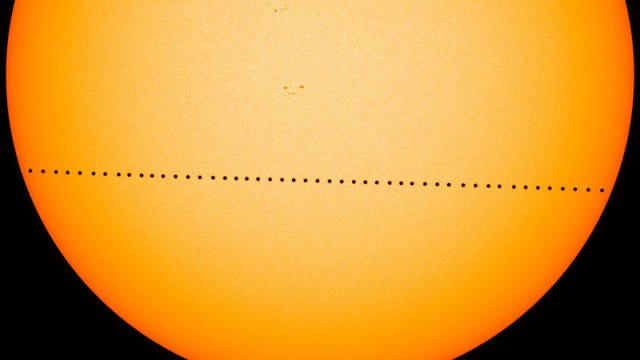Mini Mercury skips across sun's vast glare in rare transit