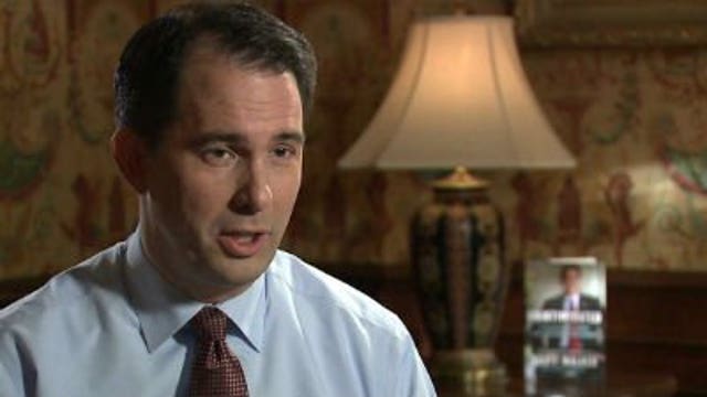Gov. Walker signs 23 bills into law in Madison