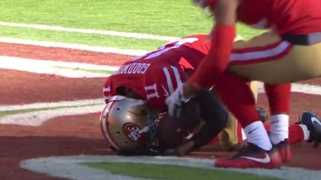 Hours after losing unborn child, NFL player scores emotional touchdown