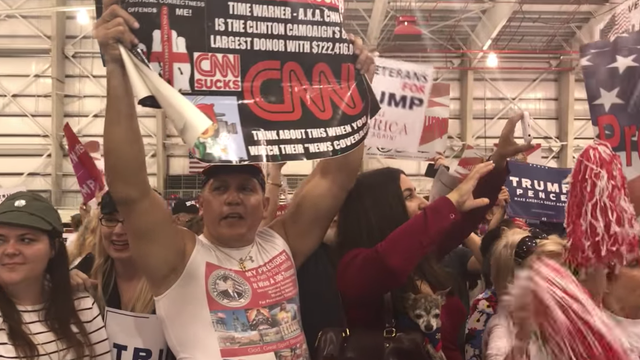 Michael Moore releases clip of accused mail bomber at rally for President Trump