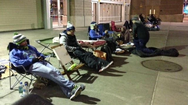 Excitement in Seattle: Seahawks fans already in line for playoff tickets, hotels filling up fast!