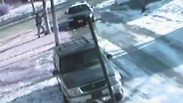 Police officers meet with concerned neighbors after weekend shootout