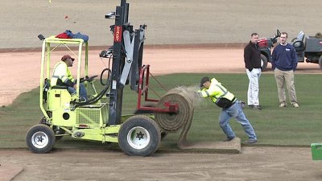 Grounds crews lay new sod at Miller Park