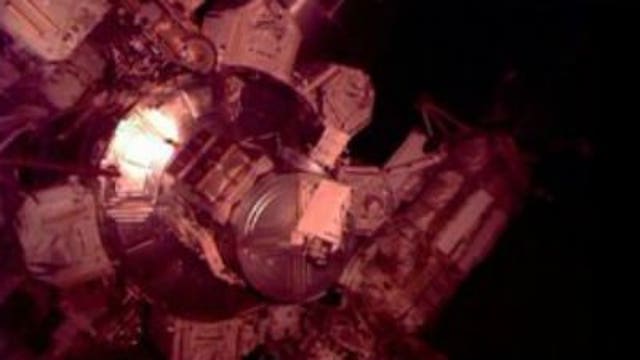 NASA cuts spacewalk outside International Space Station short