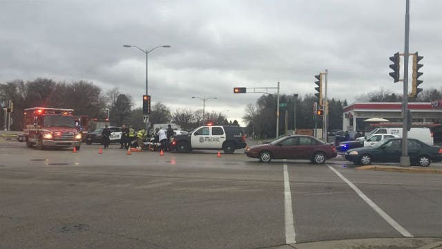 Lights & sirens activated, Milwaukee police officer hurt in collision with semi