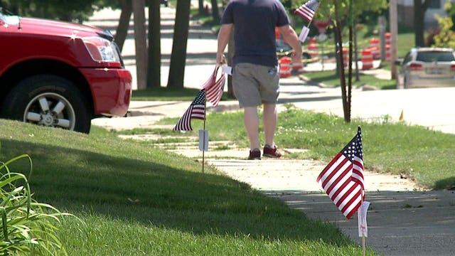 Thousands of American flags placed throughout St. Francis to celebrate 4th of July