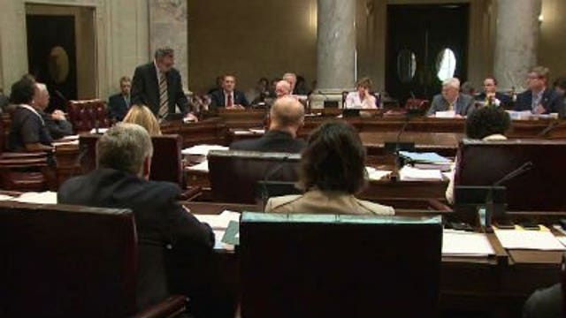State Senate passes two-year spending plan on 17-16 vote