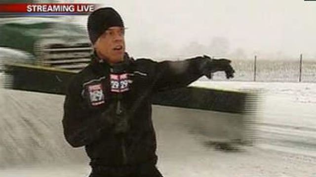 Reporter blasted with snow from snow plow while LIVE on air
