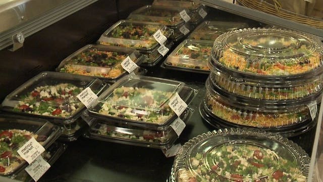 YUM! Packers fans stock up on snacks at Metro Market: Meatballs, hot wings, taco dip trays huge hits!