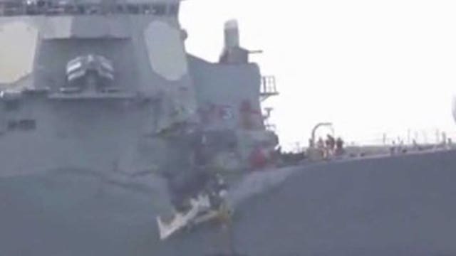 U.S. missile destroyer, oil tanker collide