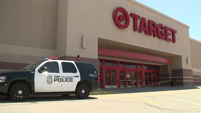 Man dressed as woman robs Target with semi-automatic handgun