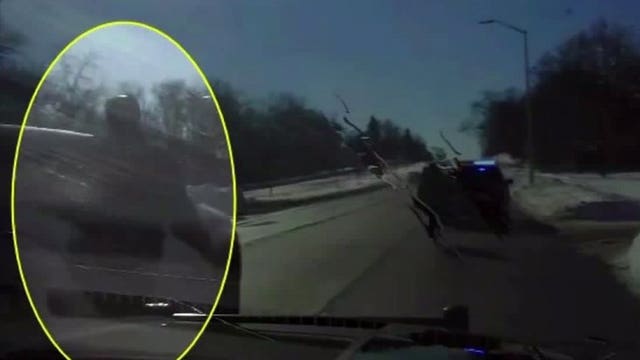 Close call caught on cam: Wauwatosa officer's elbow struck by passing SUV