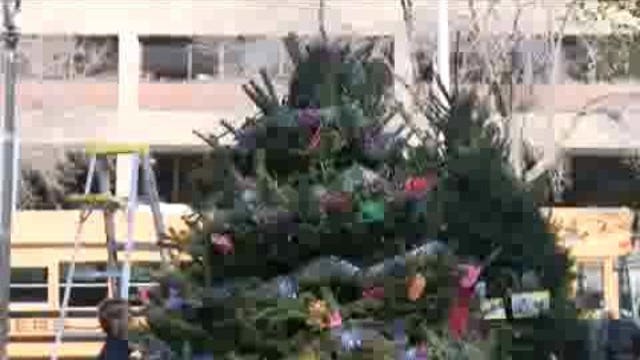 Students decorate Cathedral Square Park for the holidays