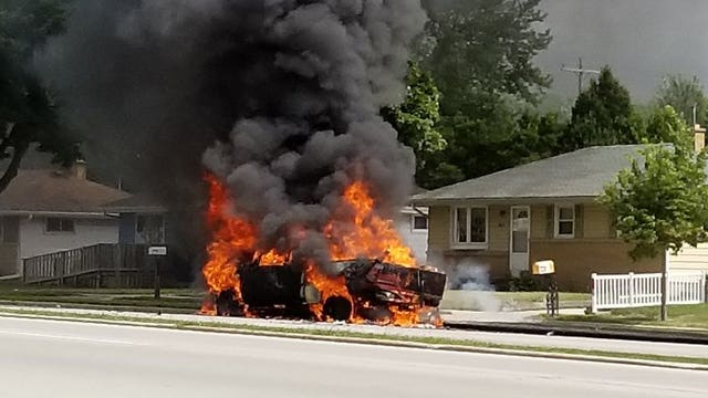 Collision between car, pickup truck leads to fiery mess