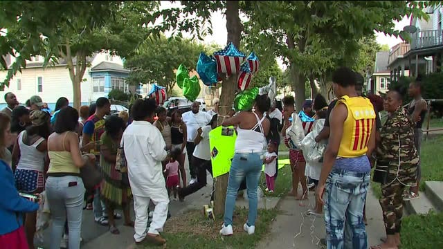 Family holds vigil for young man killed in crash near 12th and Locust