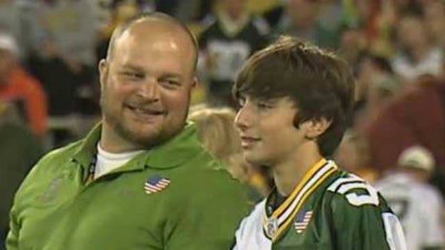 Wounded veteran, 12-year-old son attend Packers/Bears game for free