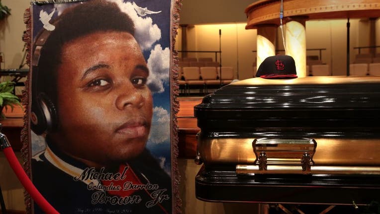 54df23e7-Funeral Held For Teen Shot To Death By Police In Ferguson, MO