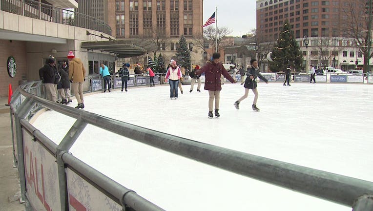 Milwaukee Admirals, police ice skate with community at Red Arrow Park.