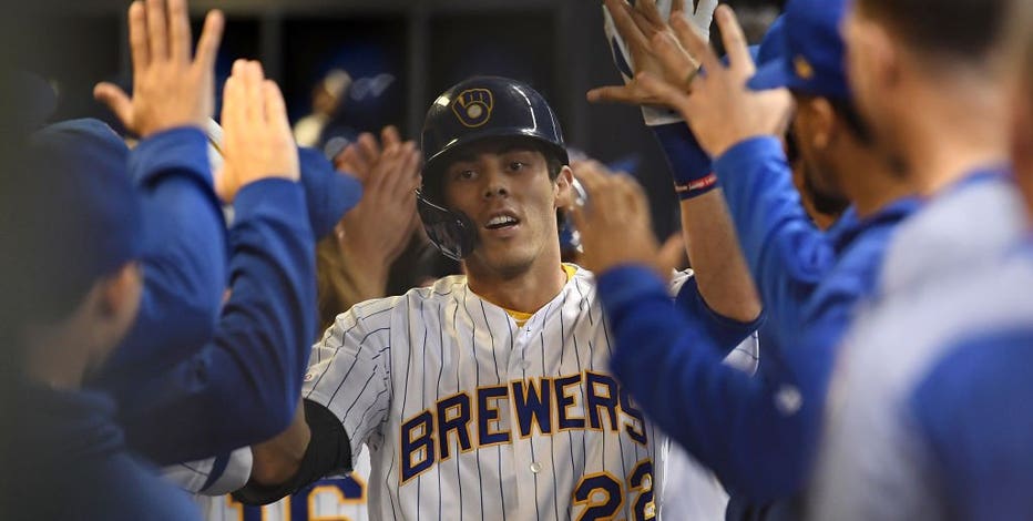 Yelich surprises fan, signed bat delivered during game