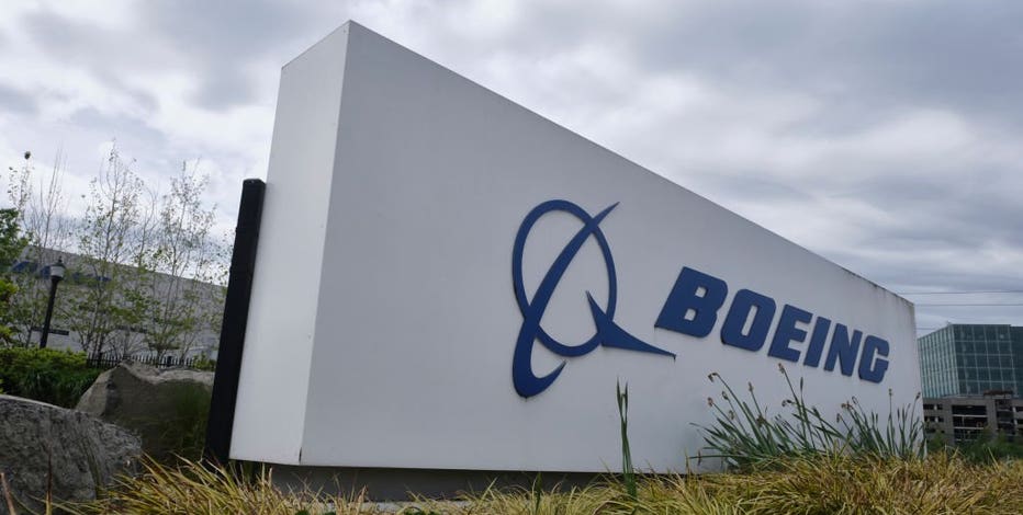 Boeing says pandemic will cut demand for planes for a decade