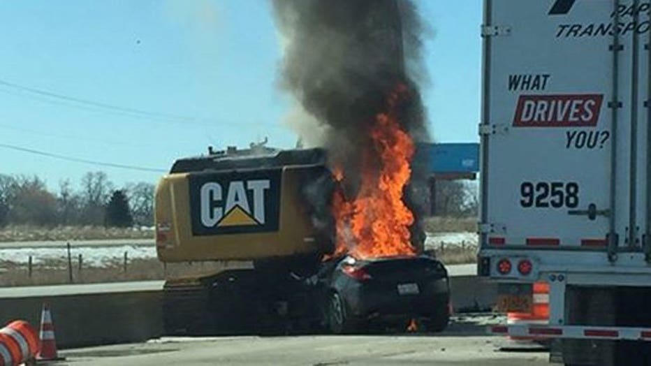 Car strikes excavator on I-94 in Racine Co.