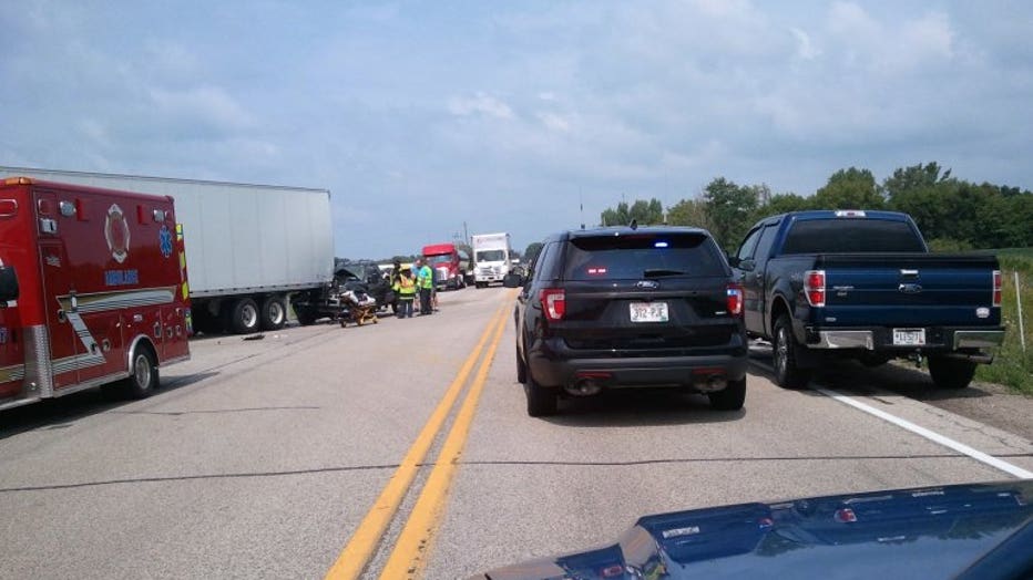 1 person hurt and cited in crash involving pickup truck, semi in Elkhorn