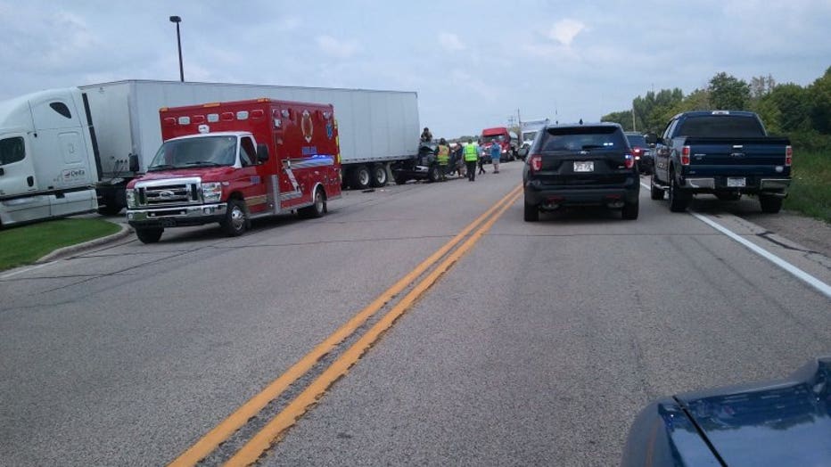 1 person hurt and cited in crash involving pickup truck, semi in Elkhorn
