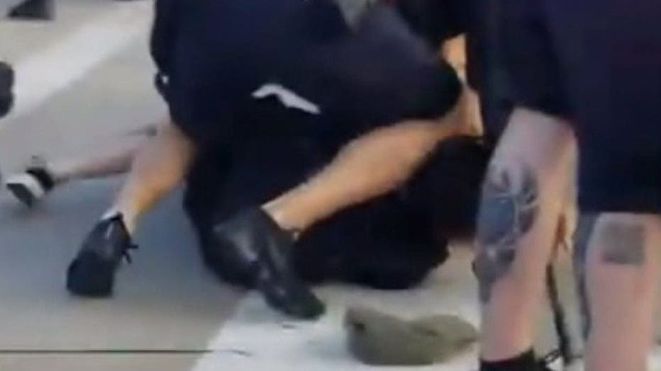 Video shows MPD officer's knee on neck of protester near 6th and Vliet