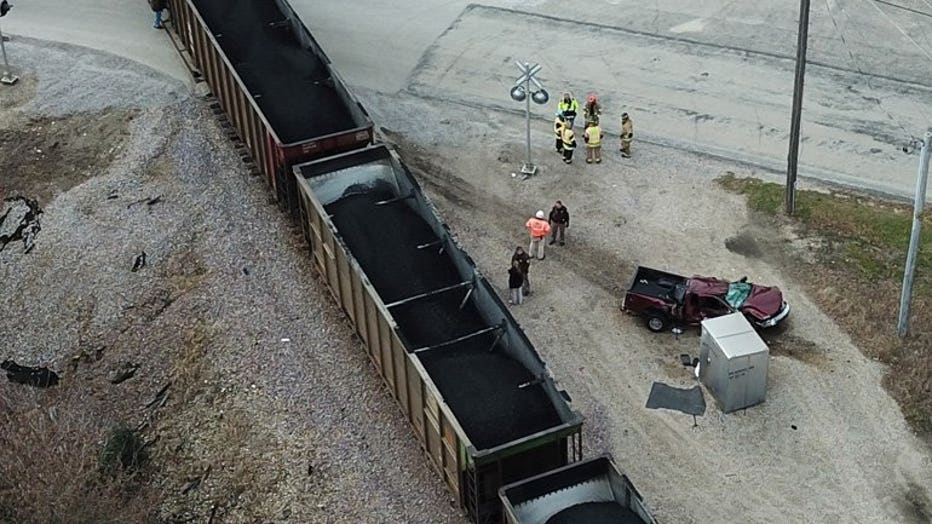SKYFOX over scene of train, truck collision