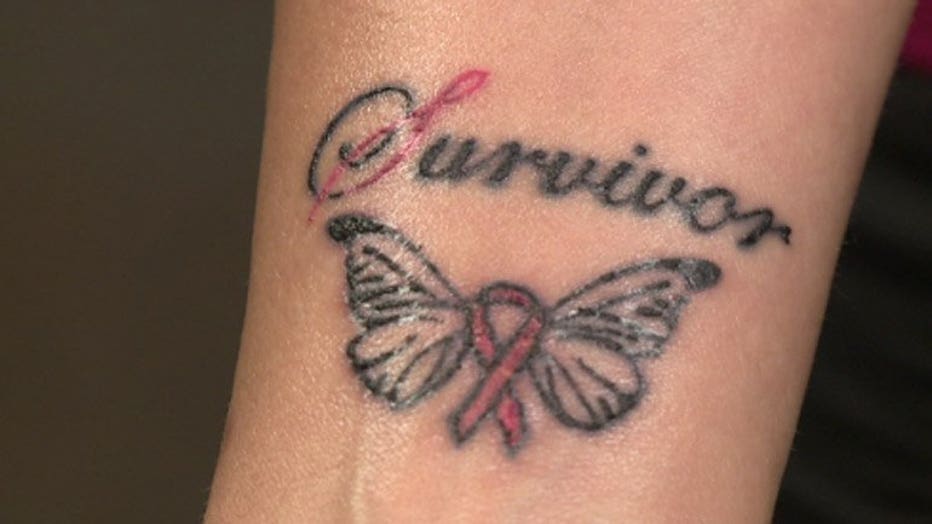 I am a survivor: Hundreds get breast cancer tattoo to raise money for a  cure