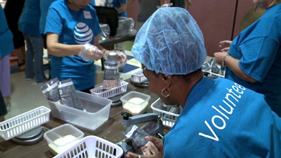 AT&T volunteers pack 20K meals to benefit people facing hunger