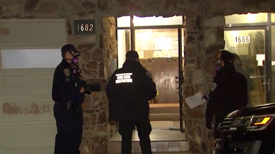 Crime scene investigators on the scene of an apparent homicide at an apartment in San Francisco's Outer Sunset neighborhood. (Courtesy: KTVU)