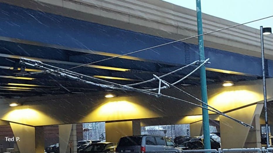 Streetcar cables taken down by snow/ice near I-794 overpass (PHOTO: Ted P.)