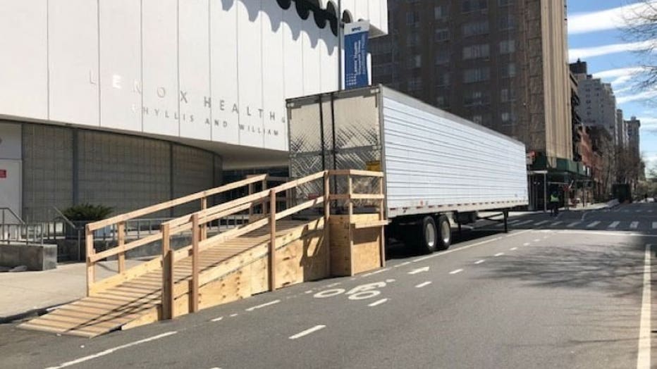 A refrigerated truck is seen outside of a Lenox Hill Hospital facility in the West Village section of Manhattan on Friday, March 27, 2020. (Jose Salvador/FOX5NY)