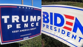 Deputies: Trump supporter punches Biden fan in sign dispute