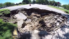 Sinkhole swallows portion of road, closes Racine County's Quarry Lake Park