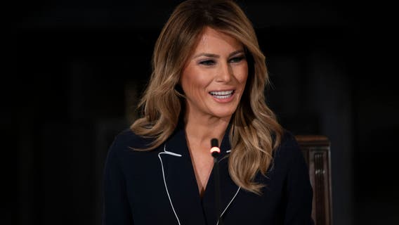 First lady opens student art exhibit on women's suffrage