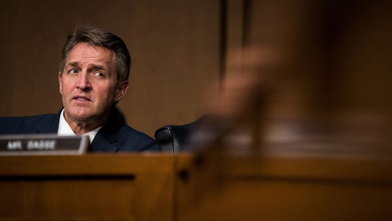 Flake backs Biden, makes conservative case against Trump