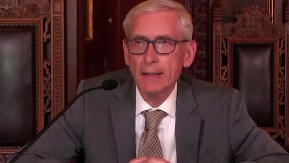 Wisconsin governor pardons 9 people, raising total to 56