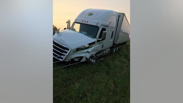 Semi driver 'may have fallen asleep,' hits unoccupied car in median of I-41