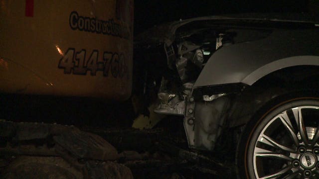 MPD: Car slams into excavator, persons in the vehicle flee the scene