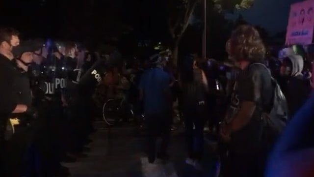 In face of stricter enforcement, protesters again hit Wauwatosa streets