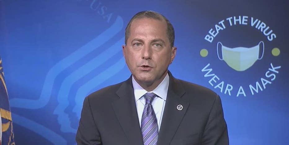 HHS Secretary Alex Azar urges Americans to keep masking up