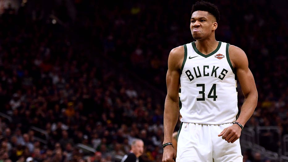 MILWAUKEE, WISCONSIN - MARCH 26: Giannis Antetokounmpo #34 of the Milwaukee Bucks reacts after a dunk against the Houston Rockets during the first half of a game at Fiserv Forum on March 26, 2019 in Milwaukee, Wisconsin. NOTE TO USER: User expressly acknowledges and agrees that, by downloading and or using this photograph, User is consenting to the terms and conditions of the Getty Images License Agreement. (Photo by Stacy Revere/Getty Images)