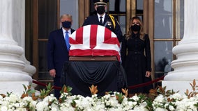 Spectators boo President Trump as he pays respects to Ruth Bader Ginsburg