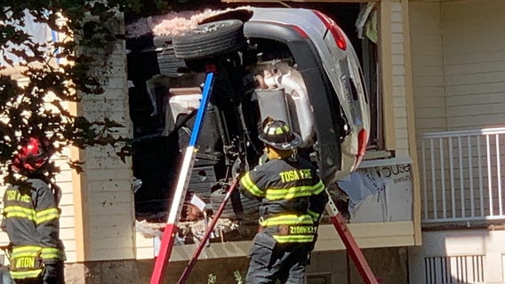 Car crashes into home near 64th and Meinecke